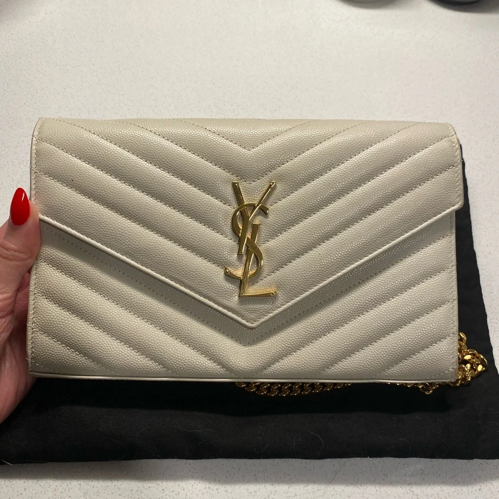 Yves Saint Laurent Ivory Quilted Crossbody with Gold Accents
Lightly used - Picture 6 of 6